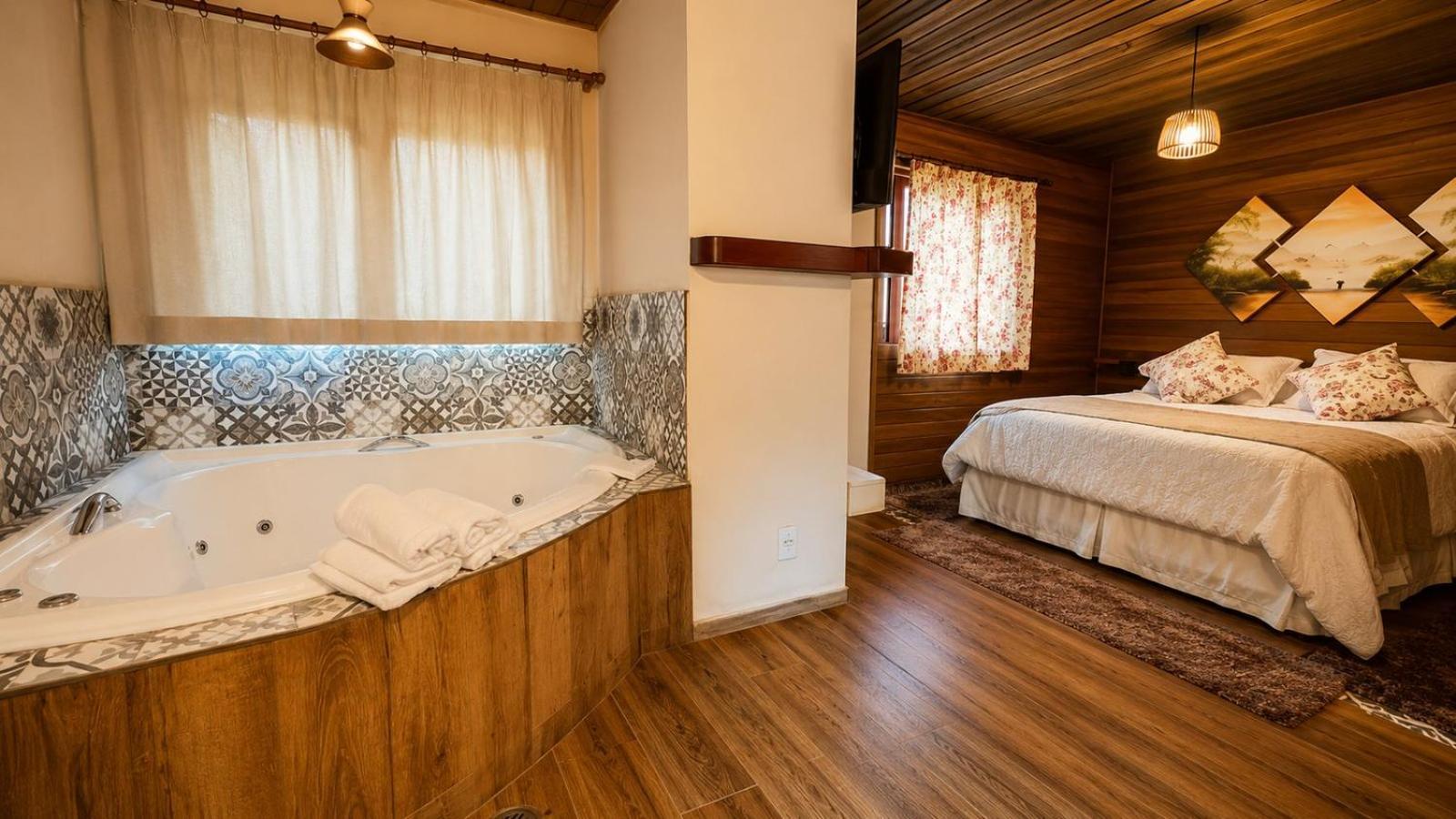 Chalé com Banheira de Hidromassagem